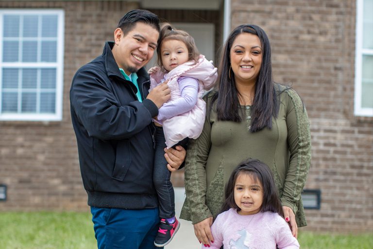 Addi and Yerald with their 2 daughters